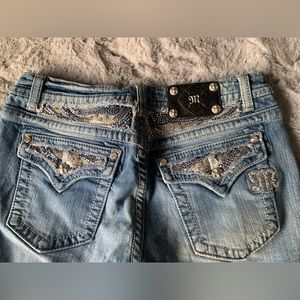 Buckle Miss Me Jeans with sequin and gem detailing around pockets